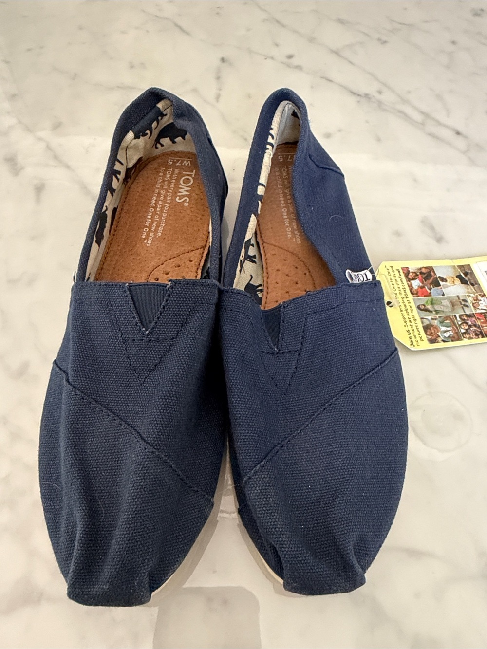 Toms Women’s Navy Canvas Slip-On Loafers